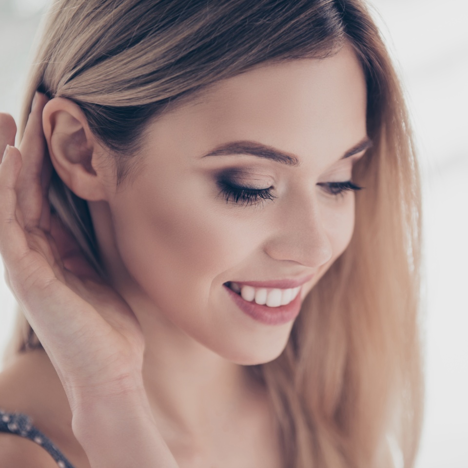 Close up portrait of successful, pretty, charming, gorgeous, cheerful, cute, modern, naked, nude, natural, positive, correcting her hair behind ear, skincare, bodycare, healthcare concept