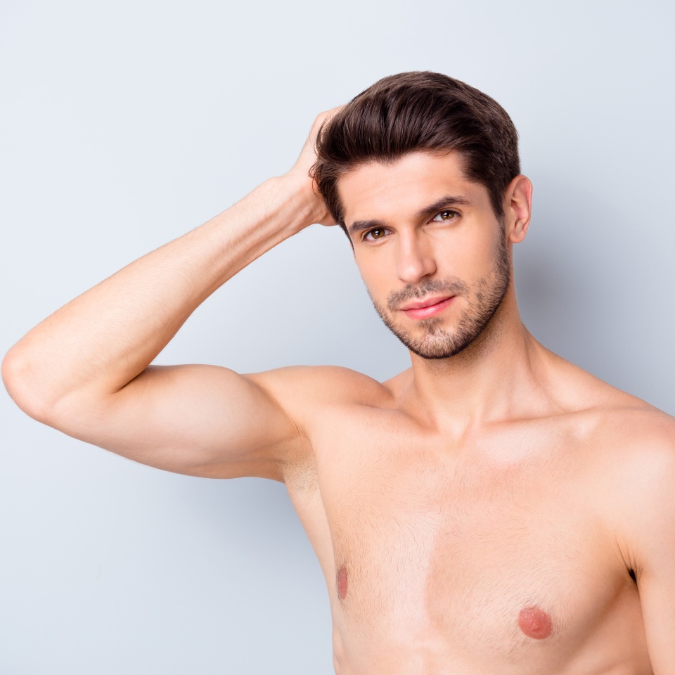 Close up photo of brutal macho man look mirror touch his shiny clear hair enjoy anti dander lotion gel perfect haircare spa salon solution isolated over grey color background