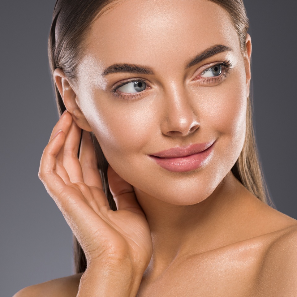 Wonab face close up beauty skin beautiful eyes lips skincare manicure hand touching skin healthy fresh face macro female cosmetic portrait